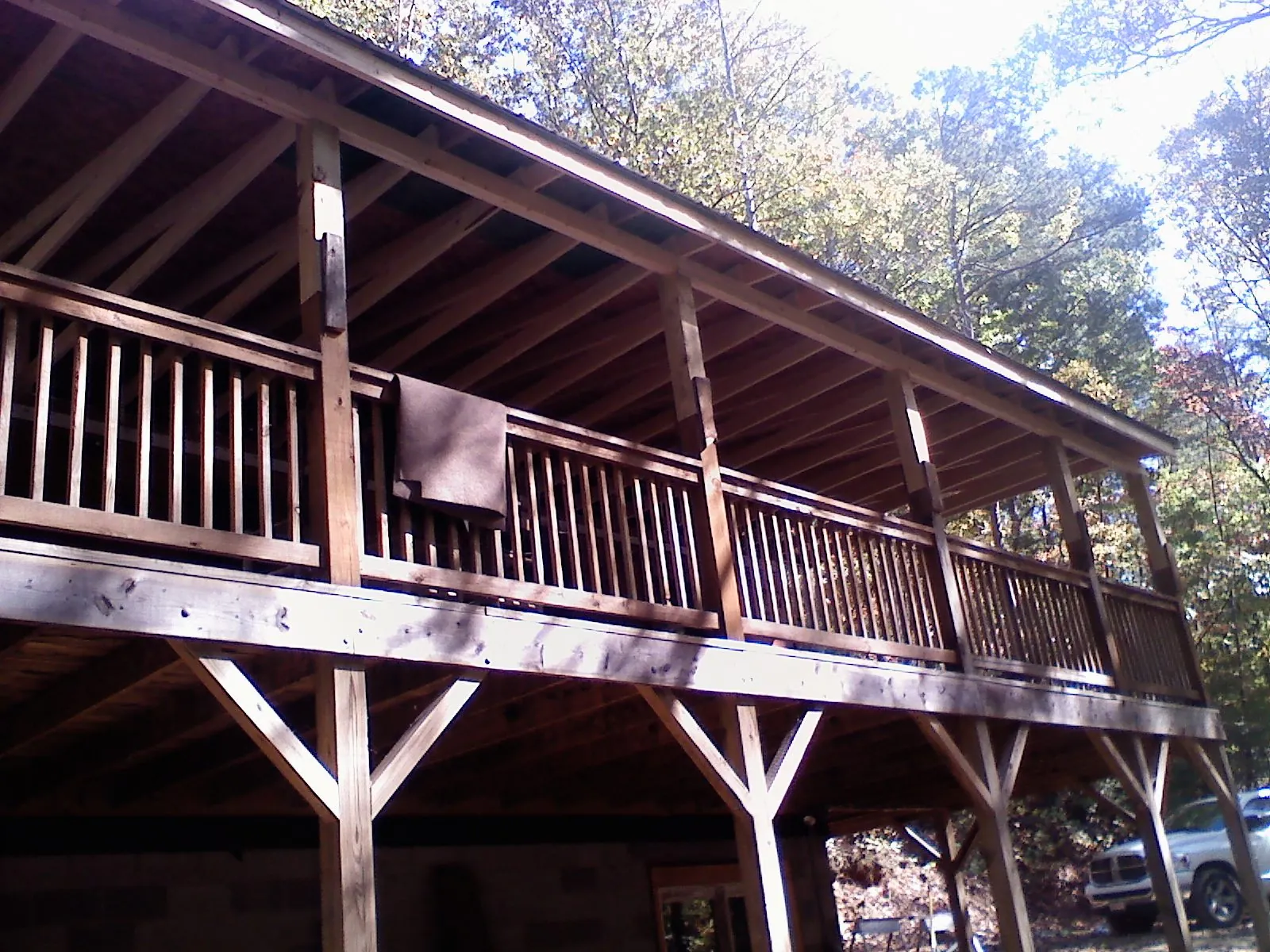 Timber framing under a new elevated porch and deck — Roof Leak Repair in Provincetown by Roofing Brothers